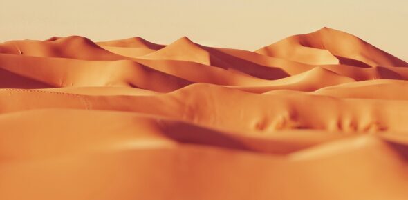 Dry sand dunes in a desert